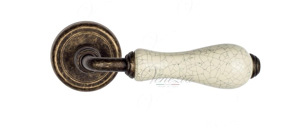Ручка дверная межкомнатная Venezia Colosseo D1 Белая керамика+античная бронза